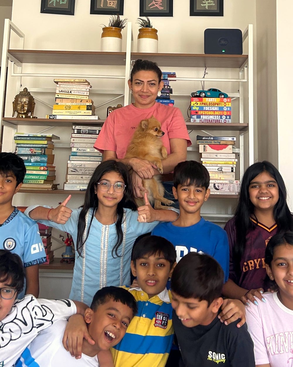 Kenaa Jadeja with a group of children at Pineappletales.